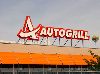 Logo eine Autobahnraststätte in Italien mit dem Namen AUTOGRILL, Materialien in orange, 70er Jahre