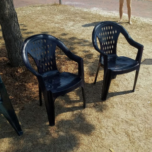 Plastic Chairs and naked legs